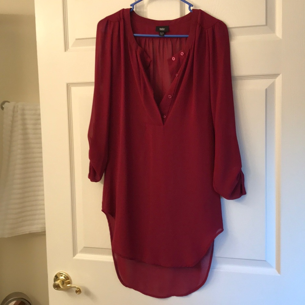 Long sheer blouse. Wear belted w/ leggings
